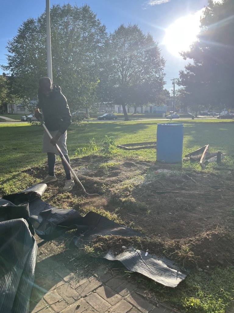 Kareem working on the Healing Garden