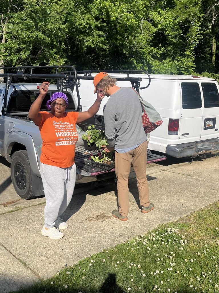 Ms. Kita dancing because she's excited about the new plants